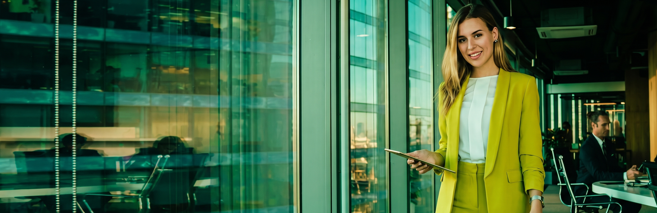 A GCC finance professional in a modern glass office